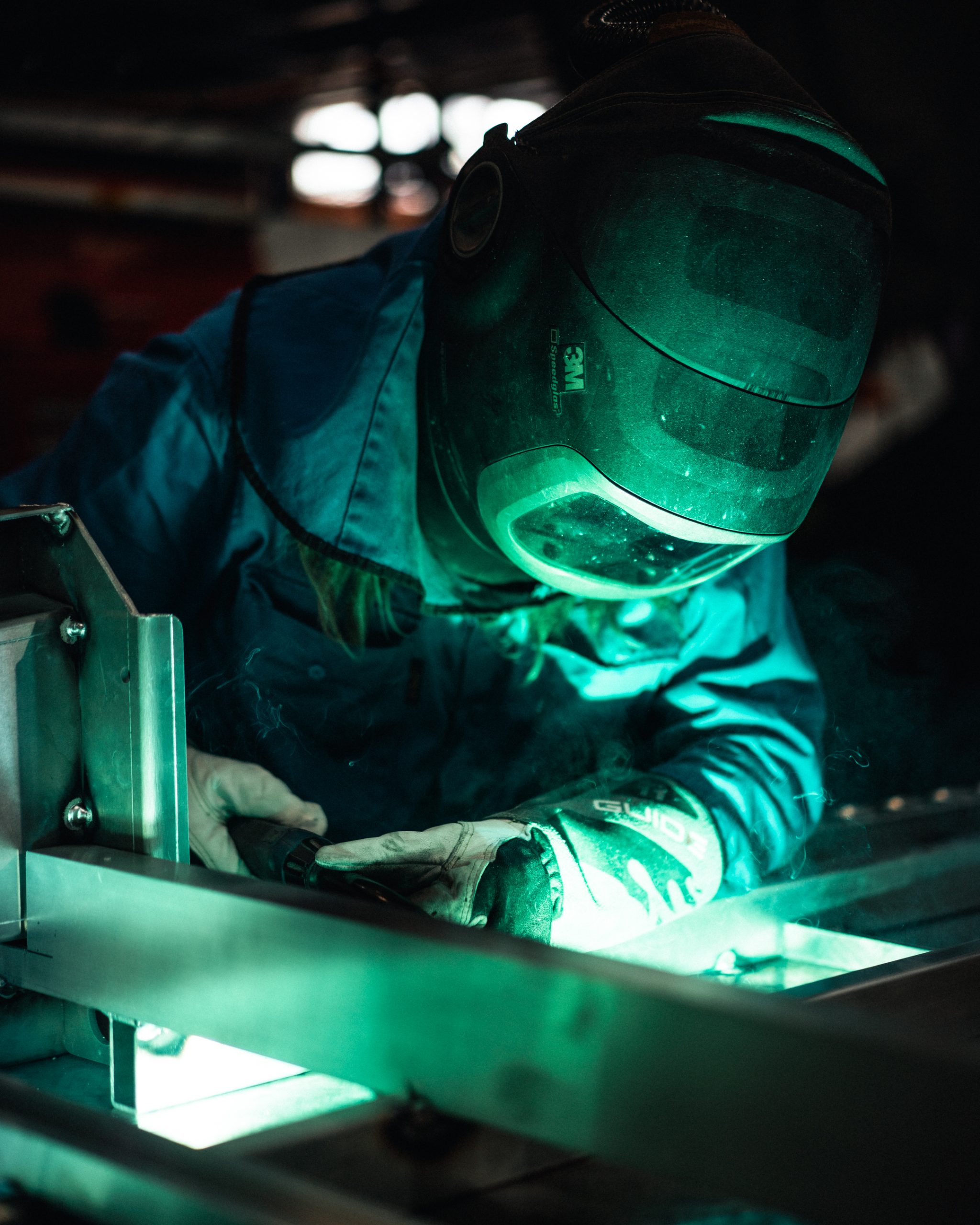 Buffalo Equip employee Welding mounts onto Heavy Duty alloy base