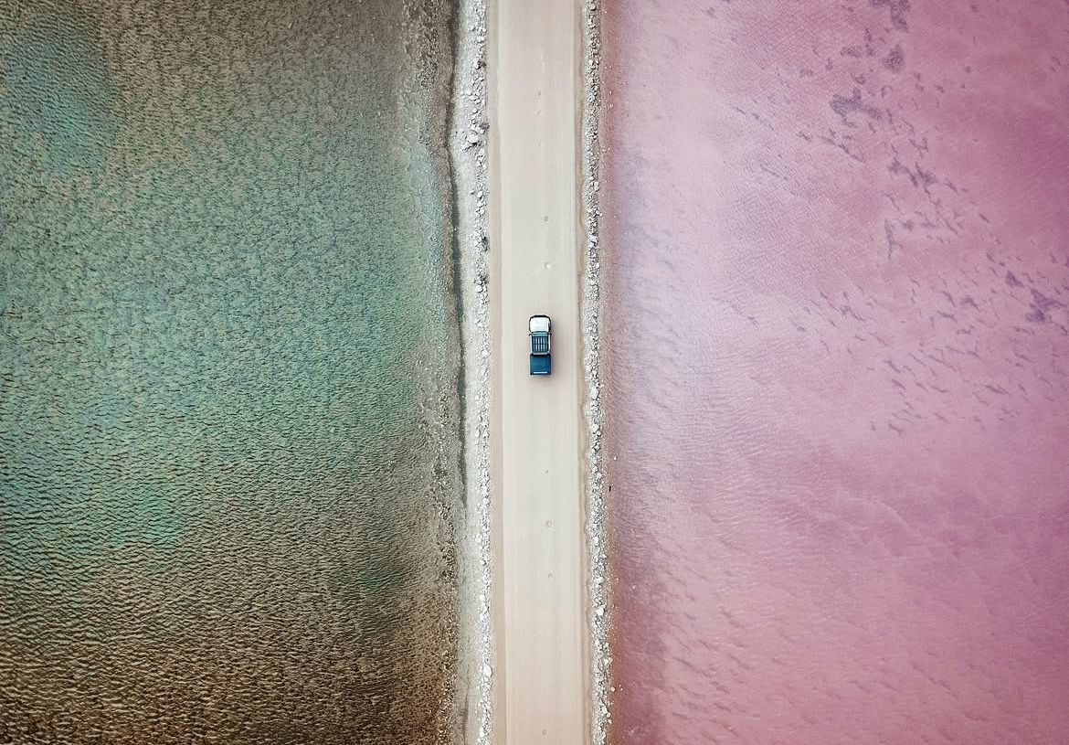 South Australia's Lake Macdonnell birds eye view of car with Buffalo Tray driving across