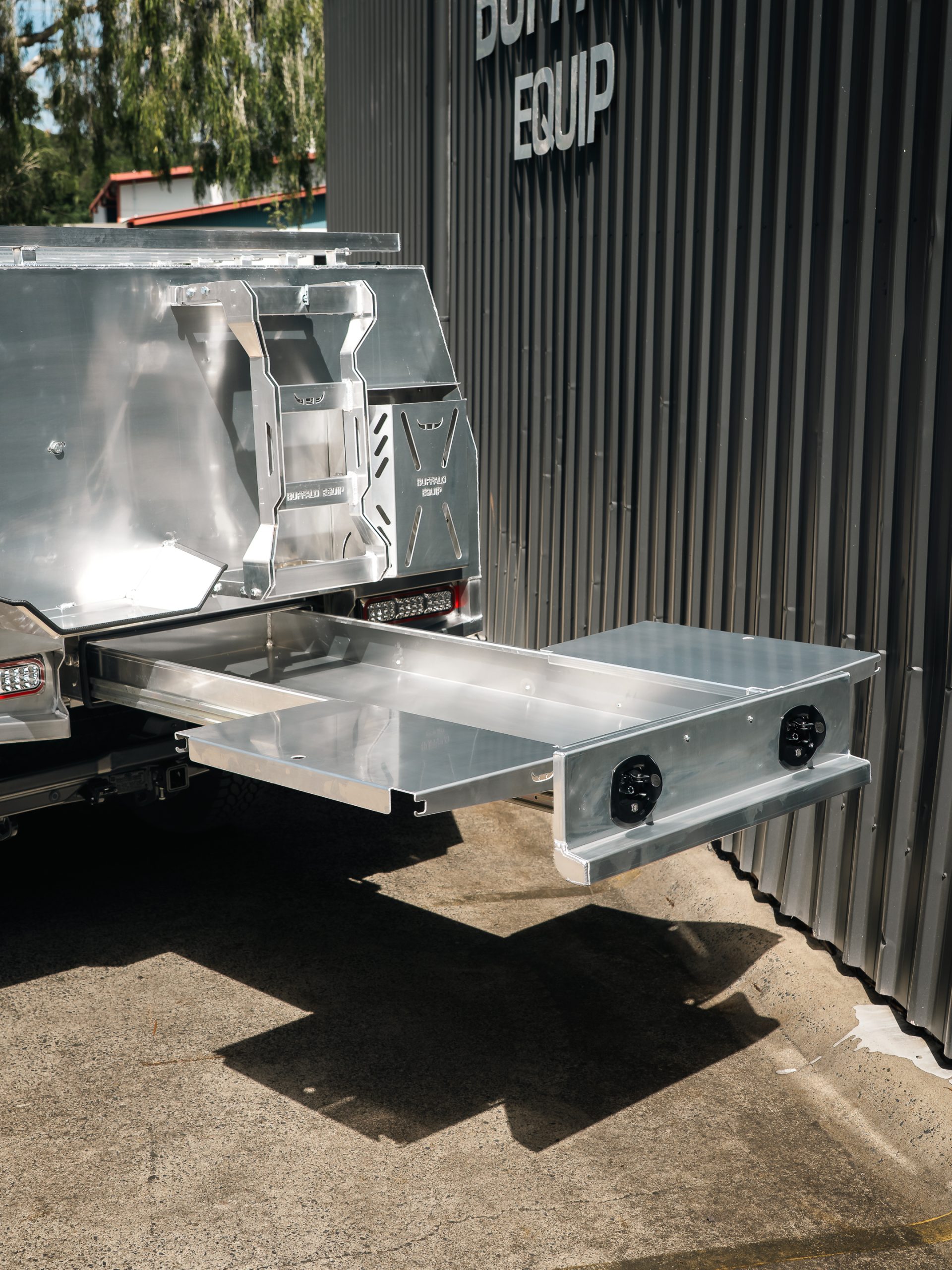 Inspiration Custom Chassis Mount Canopy with 2000mm Long Trundle Drawer featuring Two Clip-On Lid/Tables